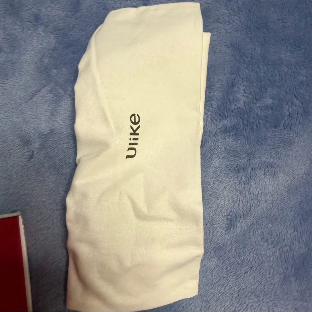 Ulike hair removal White Handheld Device in Original Box used 1 time‎